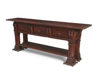 257
2003
A Spanish Colonial-style console table
Stamped verso: Taber / CO / 2003
The Taber & Co. antiqued wood table with three drawers above an undershelf, with carved scrolled accents throughout
32.5" H x 83.5" W x 18" D
Estimate: $800 - $1,200