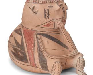 218
Late 19th/early 20th century
A Casas Grandes polychrome pottery effigy jar
The three-color jar in the form of a figure depicted in pensive repose, with red and black geometric motifs on a tan slip ground
9.75" H x 9.25" W x 11.5" D
Estimate: $400 - $600