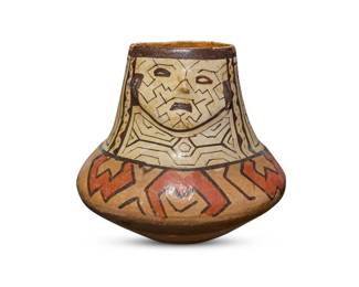 272
20th century; Peru
A Shipibo-Conibo pottery effigy vessel
The polychromed vessel with a low relief mask of a woman to the neck and painted linear geometric meanders representing Icaro, the medicine songs used in ceremonies where ayahuasca is the sacrament
6.375" H x 6.375" Dia.
Estimate: $200 - $400