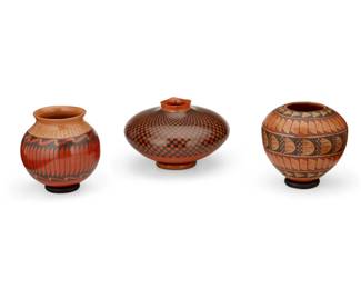339
A group of Mata Ortiz pottery vessels
Late 20th/early 21st century; Chihuahua, Mexico
Three works:
Yoly Ledezma (b. 20th century)
A wide shouldered seed pot
Incised to underside: Yoly Ledezma
The pot with squared rim above a black quadrillos pattern over a terra cotta wash
5.25" H x 8.75" Dia.
Lupe Soto (b. 20th century)
A polychrome jar
Incised to underside: Lupe Soto
The four-color jar with black, red, and green banded geometric motifs above a bird figure to underside, over a terra cotta wash
6.125" H x 6.5" Dia.
Lucy Mora de Bugarini
A polychrome olla jar
Incised to underside: Lucy Mora de Bugarini
The three-color jar with incised marking to shoulder above red and black banded feather motifs to body
6" H x 6.375" Dia.
3 pieces
Estimate: $300 - $500