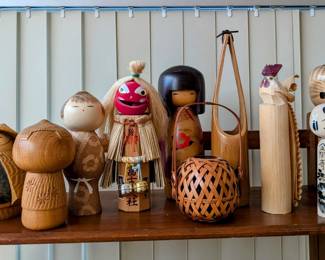 Lots of Japanese arts and crafts - kokeshi dolls, a few ikebana baskets, raku.  Lots of books about Japan and Japanese art