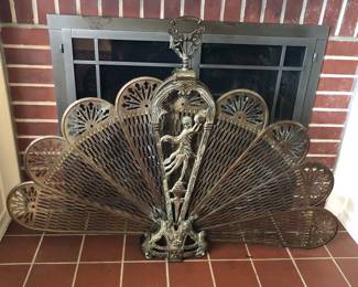 Brass fan fireplace screen - folds up. As shown: 47”L, 34”H, 6” deep at base