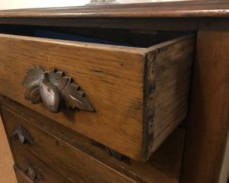 Detail of drawer pull & dovetails on side of drawer