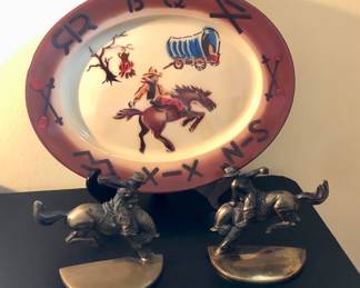 Enamel on metal cowboy platter, 1946 Russwood bronze bucking bronco bookends