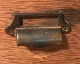 Drawer pull on blanket chest