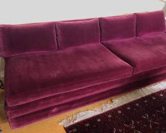 One of 2 vintage berry color velvet sofas - can form a sectional. Each is 87”L, 36”D, 25” high at back, seat is 17” from floor