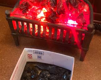 Vintage electric fireplace grate with glass rocks