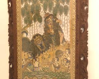 Balinese painting on fabric in carved frame (19.5” x 27”)
