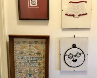 Needlepoint sampler, framed crocheted pot holders