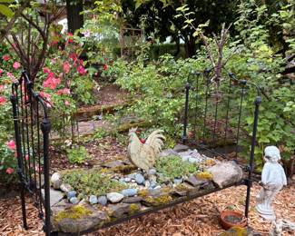 Wrought Iron Antique Toddler Bed with Succulents and Rockscaping