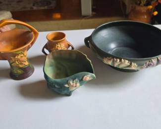 Large collection of pottery, Roseville, Mccoy, Hull, and more!!