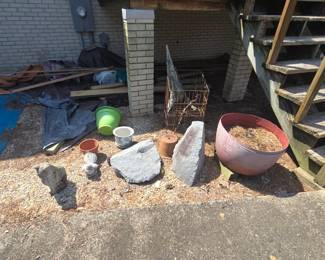 rocks, statues , concrete birdbaths and more yard art , planters etc. 