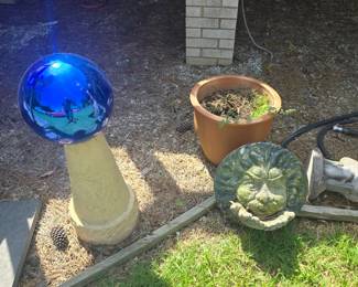rocks, statues , concrete birdbaths and more yard art , planters etc.