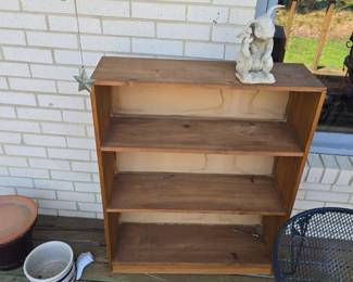 rocks, statues , concrete birdbaths and more yard art , planters etc.