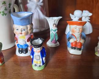 corner cabinet full of smalls and collectibles 