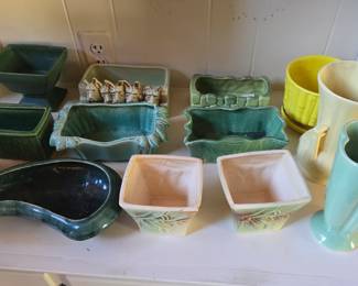 Large collection of pottery, Roseville, Mccoy, Hull, and more!!