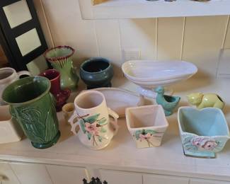 Large collection of pottery, Roseville, Mccoy, Hull, and more!!