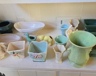 Large collection of pottery, Roseville, Mccoy, Hull, and more!!