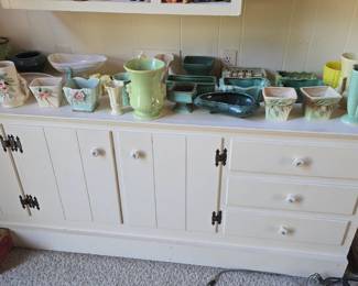 Large collection of pottery, Roseville, Mccoy, Hull, and more!!