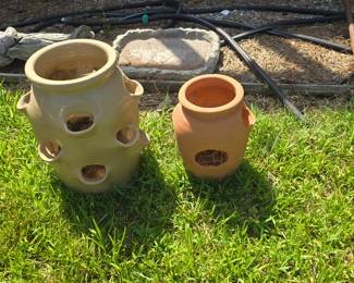rocks, statues , concrete birdbaths and more yard art , planters etc.