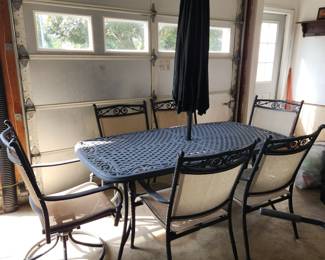 2 of these aluminum tables, each w 6 chairs