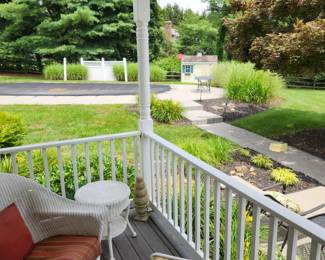 Lots of outdoor furniture. White wicker always in shed or under cover and metal tables w chairs