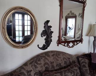 Beautiful wall mirrors, table lamps, matching couch and love seat, pillows, and more! 