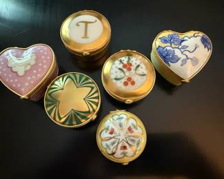 Tiffany & Co. "I Love You" Pink Heart Shaped Romance Porcelain Trinket Box, Gold & White T Monogramed Porcelain Trinket Box, Tiffany & Co. Gold and Green Porcelain Trinket Box with Star Design, Tiffany & Co. Yellow Porcelain Trinket Box with Floral Design, Tiffany & Co. Vintage Gold Porcelain Trinket Box with Cherry DesignTiffany & Co., Blue & Yellow Heart Shape Porcelain Trinket Box with Floral Design