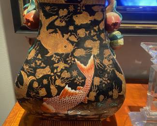 Pair of Matching Chinese Ornate Black Porcelain Vase with Embossed Gold and Red Koi Fish and Pomegranate Details