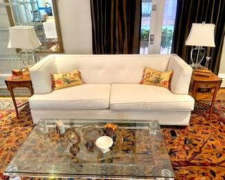 Bassett Furniture White Upholstered Love Seat, Pair of Imperial Mahogany Drop Leaf Pembroke Tables, Contemporary Glass Coffee Table, Persian Kerman Wool Pile Rug with Bird and Floral Design – 15' x 25'