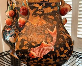 Pair of Matching Chinese Ornate Black Porcelain Vase with Embossed Gold and Red Koi Fish and Pomegranate Details