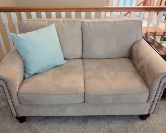 tan loveseat