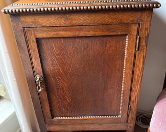 antique cupboard with bobbin legs