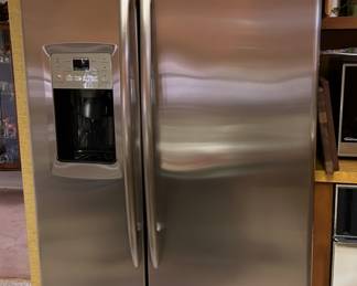 stainless sideXside refrigerator with ice and water in door