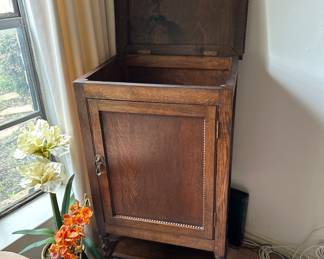 antique cabinet with spindle legs, opens front and top