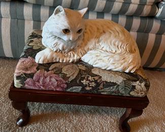 needlepoint footstool, porcelain cat