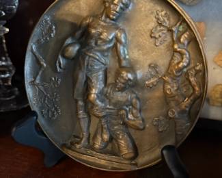 Item #214 1900 Brass Medallion Featuring Two Athletes