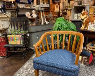 collectible books, vintage chairs, shelves, lamps, figurines
