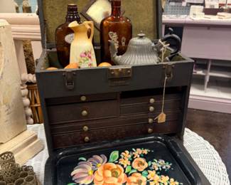 Toile hand painted tray, old bottles, small pitcher, wickers furniture
