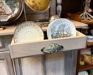 old dinnerware and vintage globe