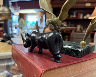 Vintage books and wooden carved animals. 