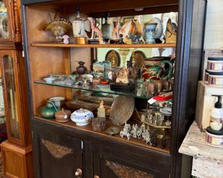 many decorative pieces and antique furniture