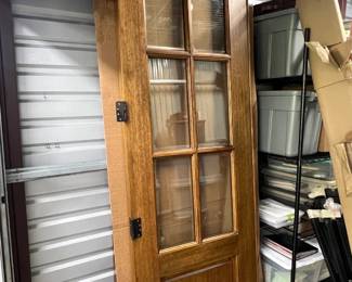 2 large wooden doors - door frame is still in unopened pacakge - 96 inches at highest point x 89 inches at shorter side - each door 34" wide