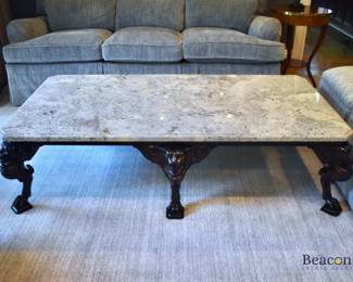 Baker Furniture marble top coffee table with lion's head legs