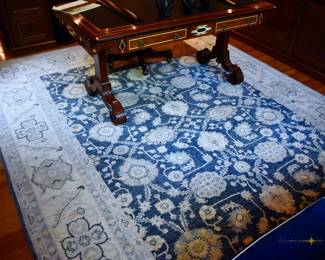 Handknotted Tabriz rug with deep blue ground.