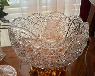 Gorgeous punch bowl with 12 matching cups and glass ladle.