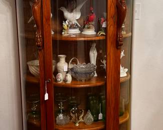 Curio cabinet and figurines