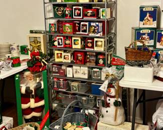 100’s of Hallmark ornaments in boxes