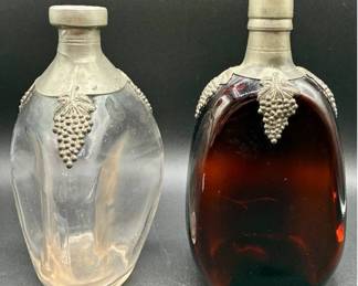 Vintage Uranium Glass 3 Sided Pinch Glass Liquor Bottle with Pewter Details & Vintage Red 2 Sided Dimpled Glass Bottle with Pewter Details