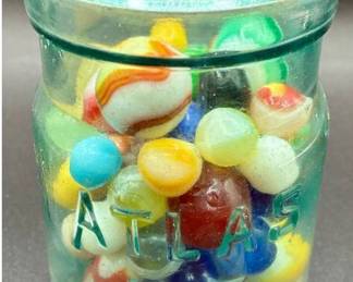 Collection of Vintage Marbles in Atlas Blue Jar- Includes a few Shooters and Uranium Glass Marbles